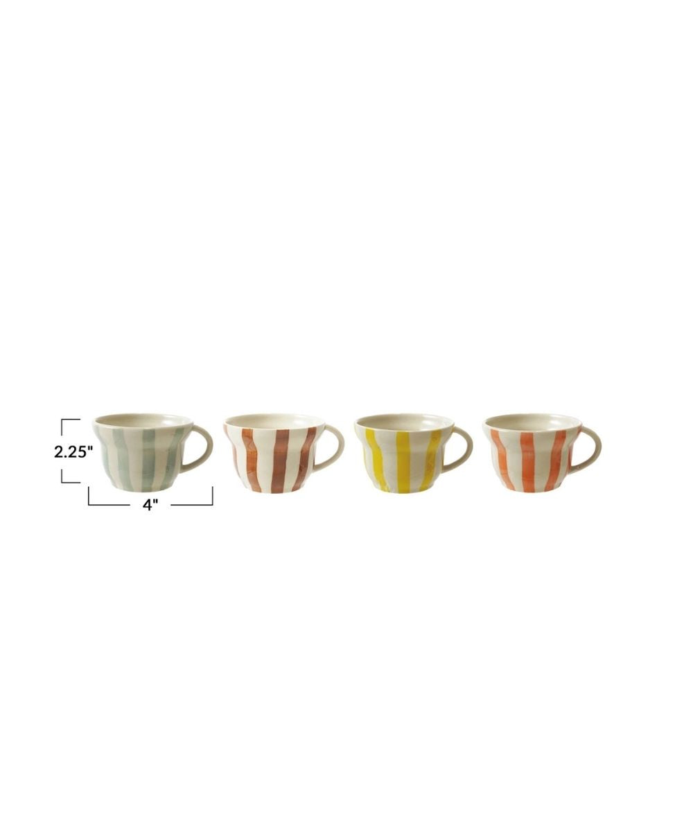 Four patterned mugs on a white background with measurements indicated.