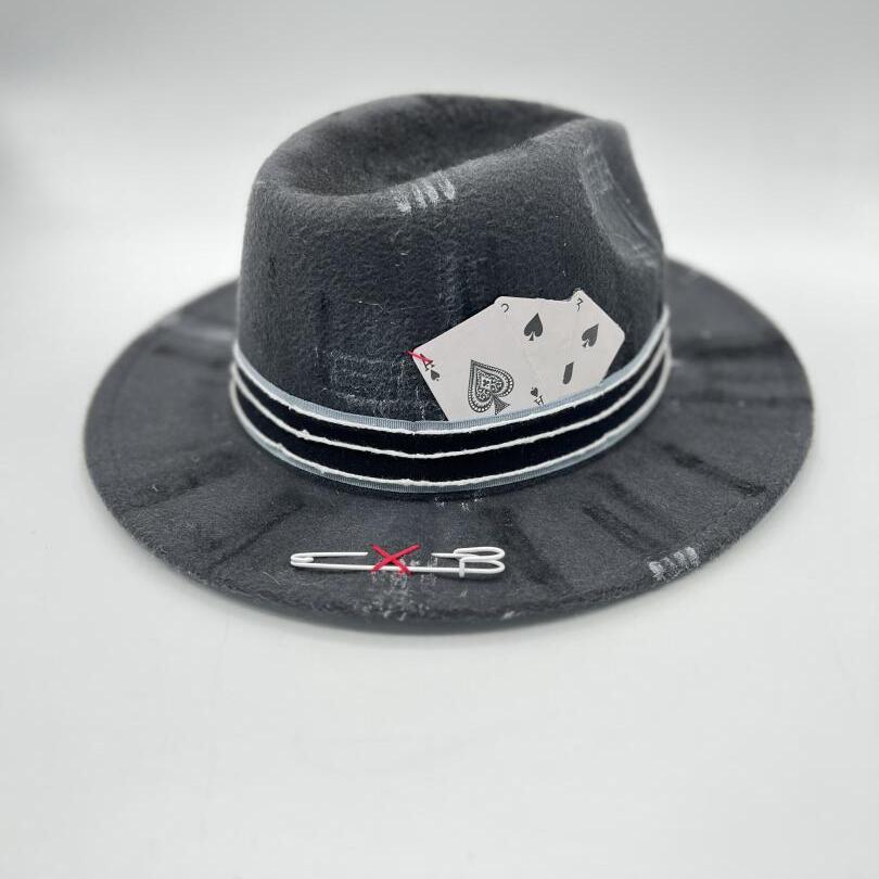 Grey fedora painted and cut