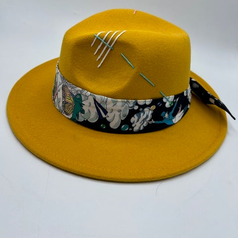 Mustard color fedora with baby blue stitches