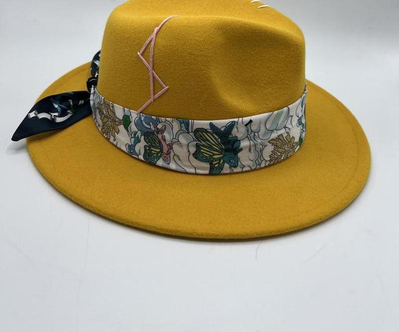 Mustard color fedora with baby blue stitches