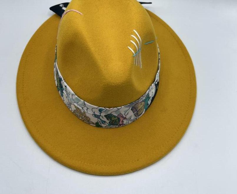 Mustard color fedora with baby blue stitches
