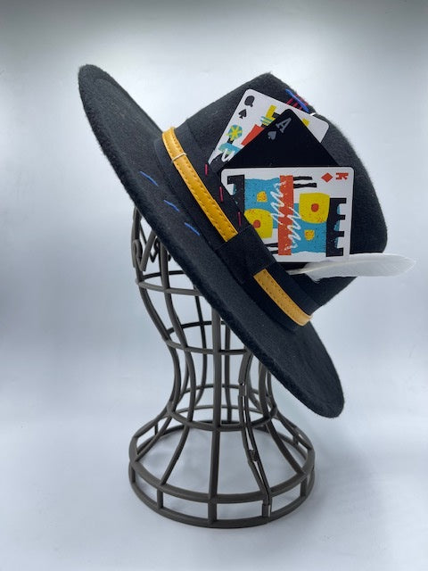 Black fedora with colorful cards