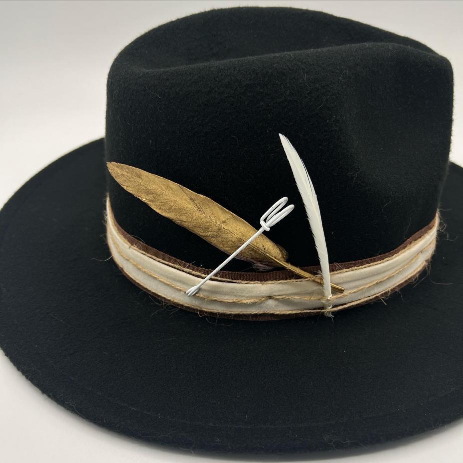 Black fedora with gold feather