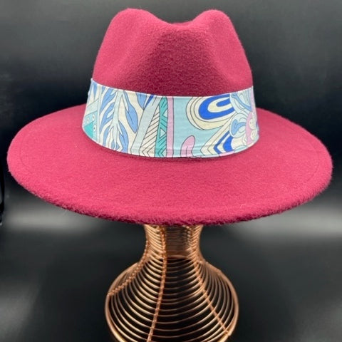 Burgundy fedora with flower accessory