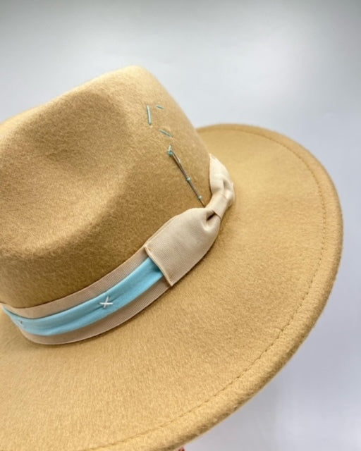 Cappuccino color fedora with baby blue strap