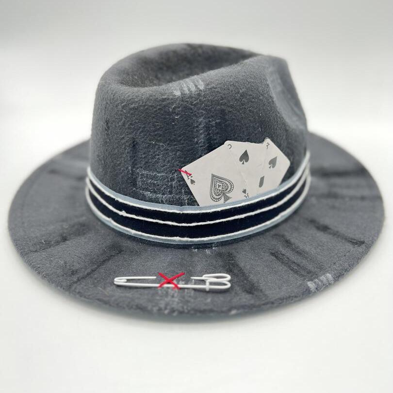 Grey fedora painted and cut