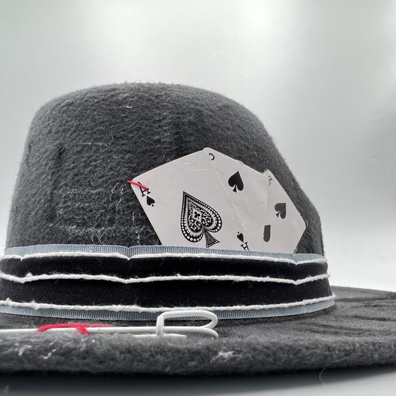 Grey fedora painted and cut