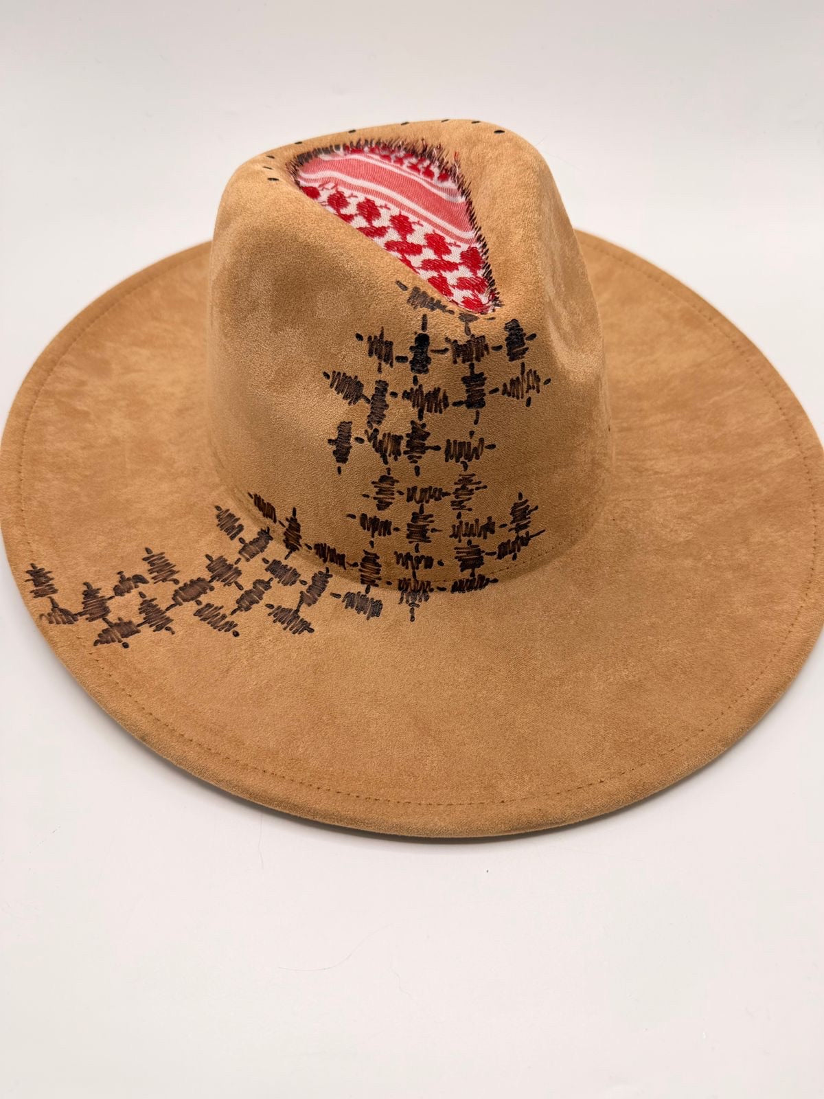 Wide brim light brown fedora with red shemagh fabric