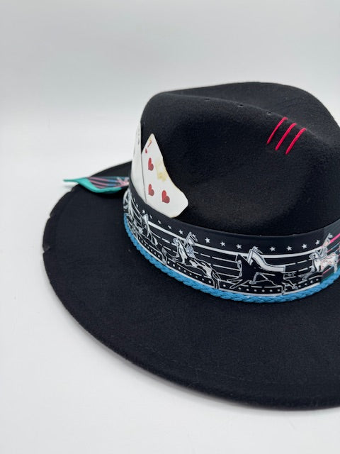 Black fedora with turquoise and red details