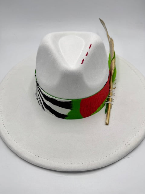 Wide brim white Fedora with colorful scarf and gold feather