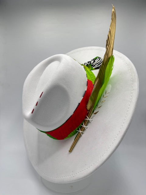 Wide brim white Fedora with colorful scarf and gold feather