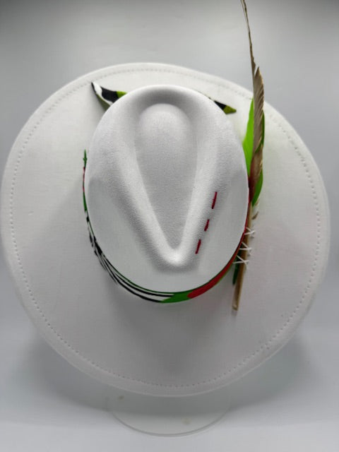 Wide brim white Fedora with colorful scarf and gold feather