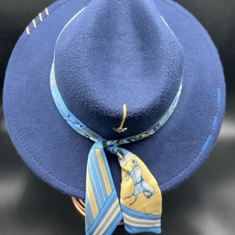 Navy blue fedora with angel accessory