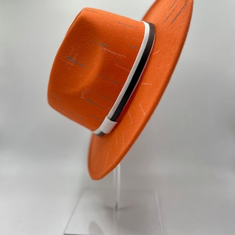 Orange fedora with white and brown band