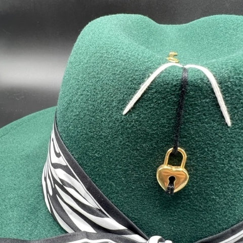 Royal green fedora with heart accessory
