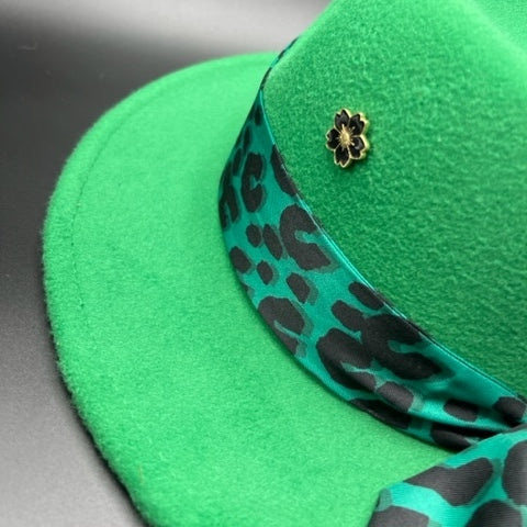 Vibrant green fedora with black details