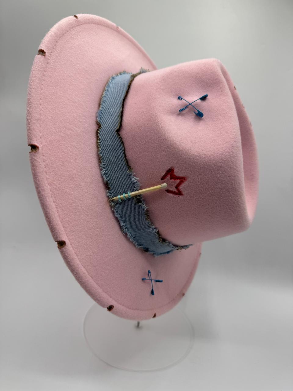 Pink fedora with jeans strap and flame