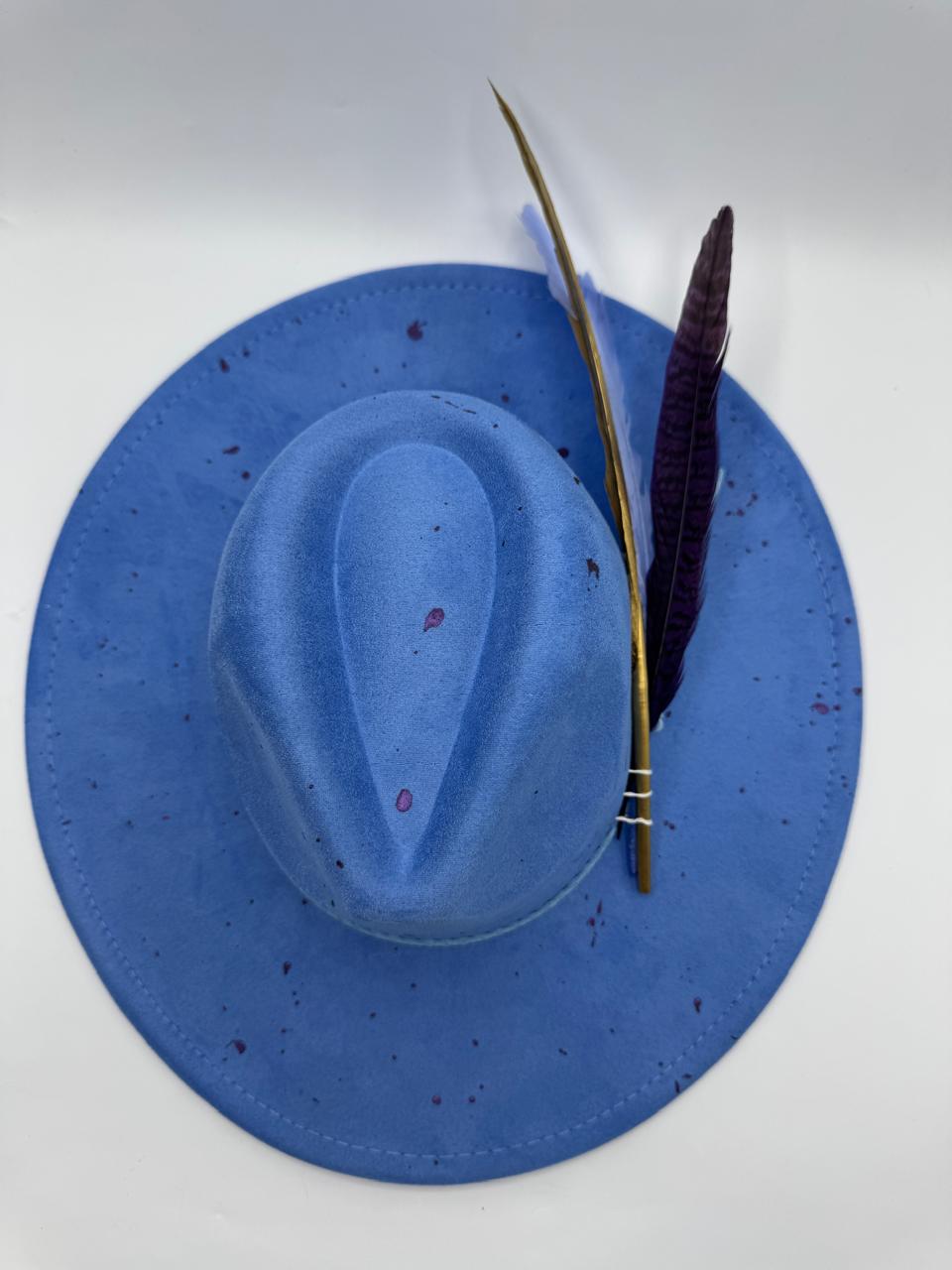 Wide brim blue fedora with splashes and feathers