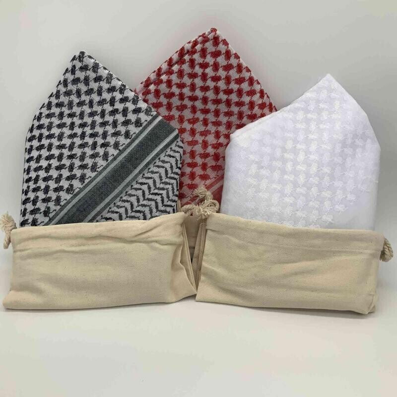 Zero Waste Wrapping with an Arabic styled scarf, solid wood tieing ring & small wooden gift tag