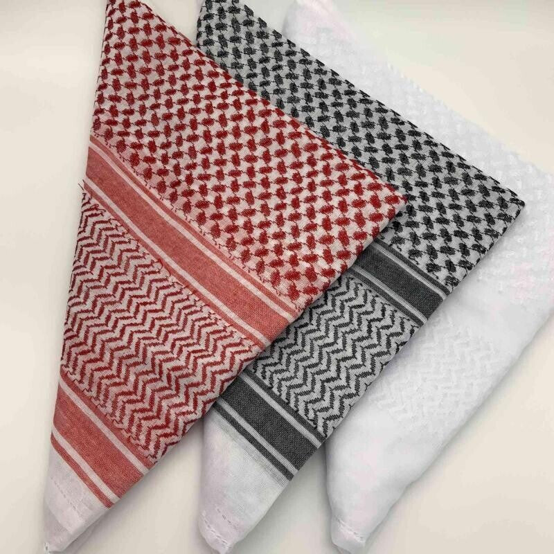 Zero Waste Wrapping with an Arabic styled scarf, solid wood tieing ring & small wooden gift tag