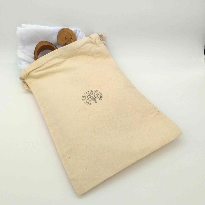 Zero Waste Wrapping with an Arabic styled scarf, solid wood tieing ring & small wooden gift tag