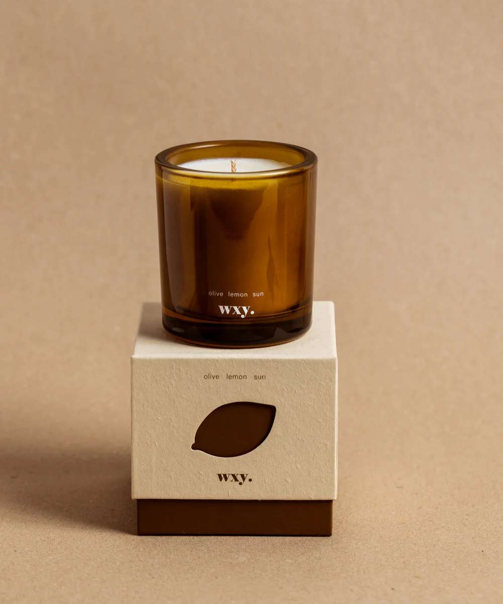 Wxy. Roam  Olive. Lemon. Sun. Glass Candle