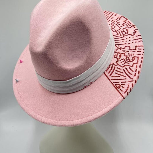 Pink fedora with carving and studs