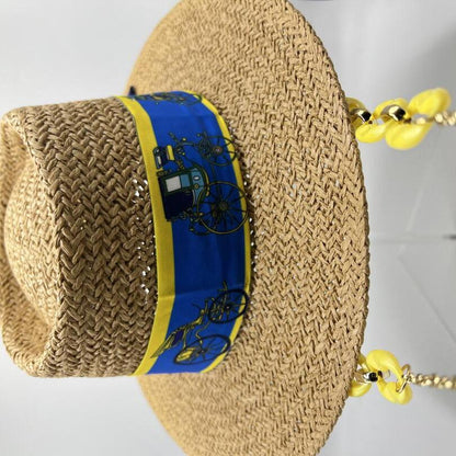 Paper straw hat with yellow and blue details