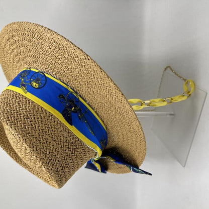 Paper straw hat with yellow and blue details