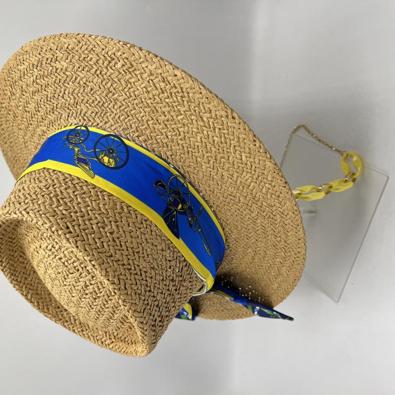 Paper straw hat with yellow and blue details