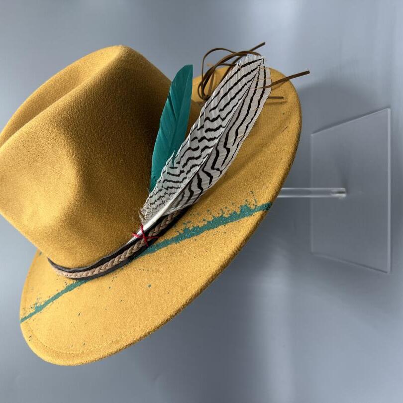 Brown fedora with turquoise and feathers