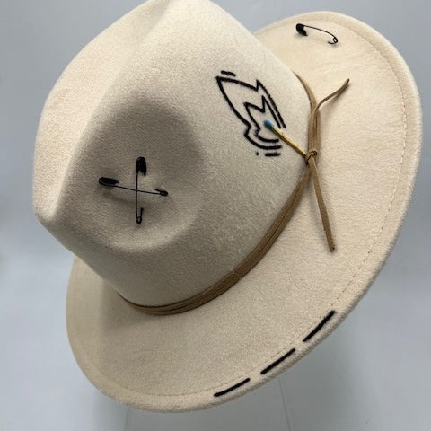 Beige hat with baby blue feather