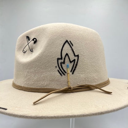 Beige hat with baby blue feather