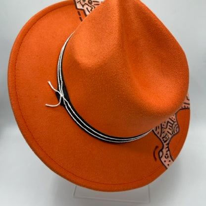 Orange fedora with hand drawing