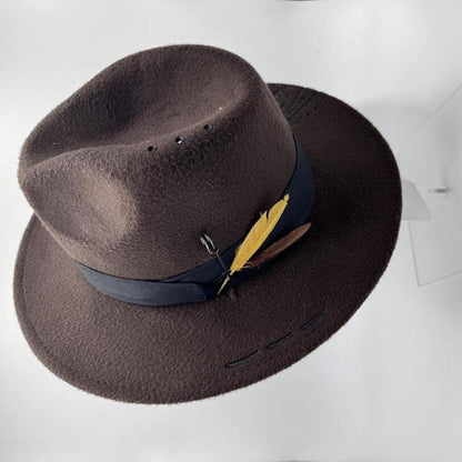 Dark brown fedora with hand carving and feathers