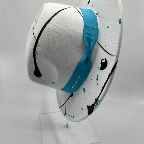 White fedora with splashes and turquoise band