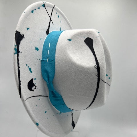 White fedora with splashes and turquoise band