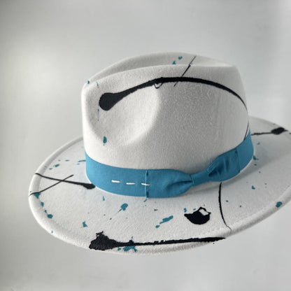 White fedora with splashes and turquoise band