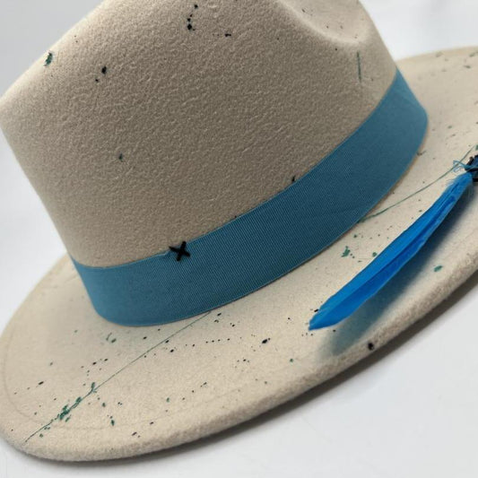 Beige fedora with splashes and turquoise band