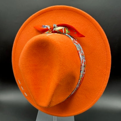 Orange fedora with yellow stitches