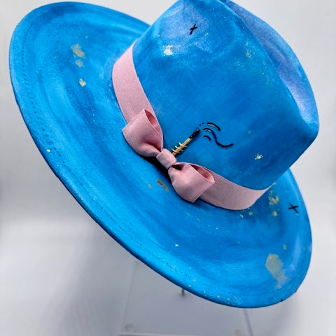 Large brim blue fedora with gold