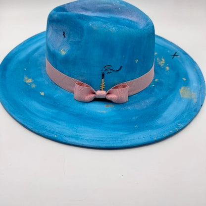 Large brim blue fedora with gold