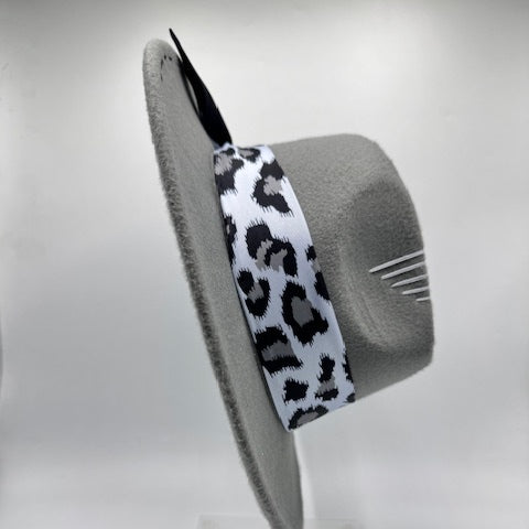 Grey fedora with animal print scarf