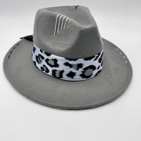 Grey fedora with animal print scarf