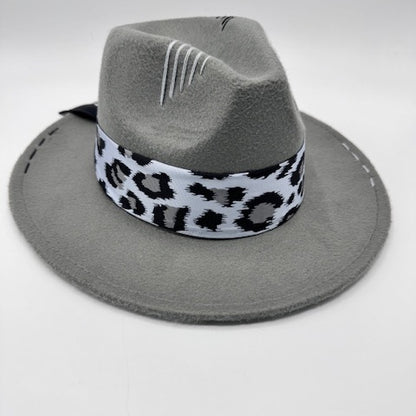 Grey fedora with animal print scarf