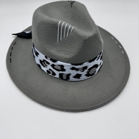 Grey fedora with animal print scarf