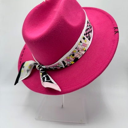 Fuschia fedora with black and white details