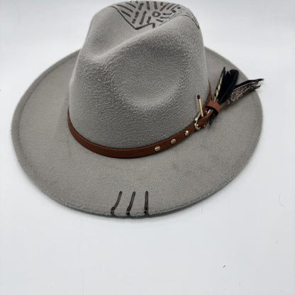 Grey fedora with carving and feathers