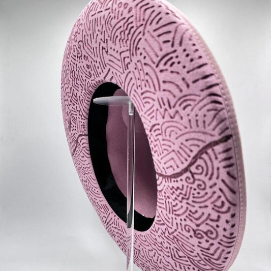   Wide brim pink fedora with carvings