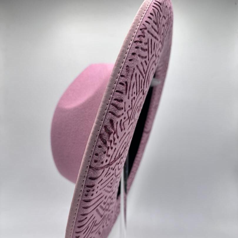   Wide brim pink fedora with carvings